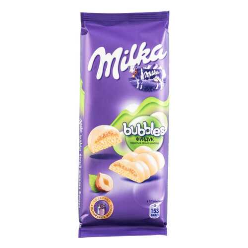 Шоколад белый пористый Milka bubbles с фундуком 83 г в Магнит